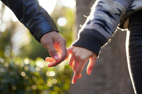Photo by pepe talens a close up of two people holding hands